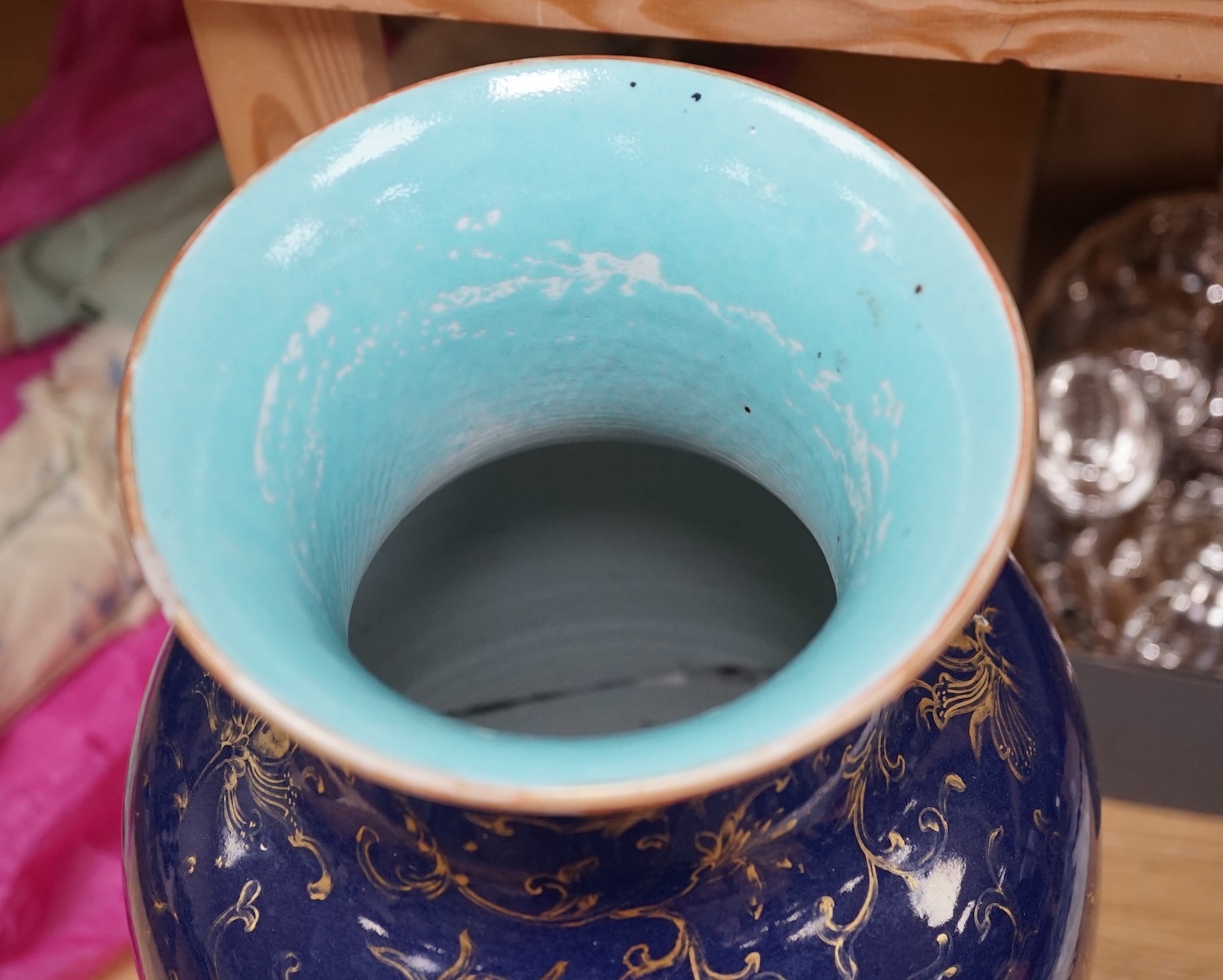 A Chinese gilt decorated blue glazed vase, early 19th century, 48.5cm high. Condition - one side has a large oval break which as been reglued, the gilt decoration is rubbed